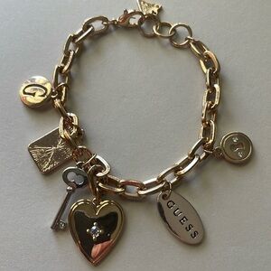 DESIGNER GUESS SILVER CHARM BRACELET